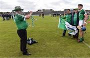 2 July 2016; Limerick supporter Pa Buckley takes a photograph at the end of the game of Gavin O'Mahony with supporters at the GAA Hurling All-Ireland Senior Championship Round 1 match between Westmeath and Limerick at TEG Cusack Park in Mulligar, Co. Westmeath. Photo by David Maher/Sportsfile