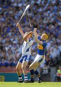 15 August 2010; Lar Corbett catches the sliothar ahead of Waterford full-back Liam Lawlor before scoring the first goal for Tipperary. GAA Hurling All-Ireland Senior Championship Semi-Final, Waterford v Tipperary, Croke Park, Dublin. Picture credit: Ray McManus / SPORTSFILE