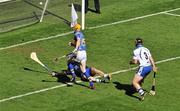 15 August 2010; Lar Corbett, Tipperary, beats Waterford full-back Liam Lawlor, 3, and goalkeeper Clinton Hennessy to score his side's first goal. GAA Hurling All-Ireland Senior Championship Semi-Final, Waterford v Tipperary, Croke Park, Dublin. Picture credit: Brendan Moran / SPORTSFILE