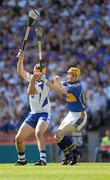 15 August 2010; Lar Corbett catches the sliothar ahead of Waterford full-back Liam Lawlor before scoring the first goal for Tipperary. GAA Hurling All-Ireland Senior Championship Semi-Final, Waterford v Tipperary, Croke Park, Dublin. Picture credit: Ray McManus / SPORTSFILE