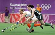 16 August 2010; Amy Cook, Ireland, in action Lara Dell'Anna, Netherlands, during their preliminary girls' hockey match. Netherlands beat Ireland 3-1. 2010 Youth Olympic Games, Sengkang Hockey Stadium, Singapore.