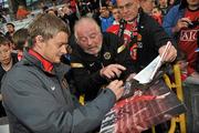 19 August 2010; Manchester United Reserves manager Ole Gunnar Solskjaer signs autographs before the match. Platinum One Challenge, Arsenal Reserves v Manchester United Reserves, Tallaght Stadium, Tallaght, Dublin. Picture credit: Brian Lawless / SPORTSFILE