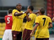 19 August 2010; Jay Thomas, left, Arsenal Reserves, celebrates with team-mates, from left, Wellington Silva, right, and Craig Eastmond, after scoring his side's first goal. Platinum One Challenge, Arsenal Reserves v Manchester United Reserves, Tallaght Stadium, Tallaght, Dublin. Picture credit: Brian Lawless / SPORTSFILE