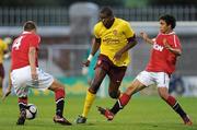 19 August 2010; Jay Thomas, Arsenal Reserves, in action against Scott Wootton, left, and Fabio da Silva, Manchester United Reserves. Platinum One Challenge, Arsenal Reserves v Manchester United Reserves, Tallaght Stadium, Tallaght, Dublin. Picture credit: Brian Lawless / SPORTSFILE