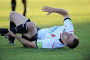 20 August 2010; Fahrudin Kuduzovic, Dundalk, lies on the ground after receiving an injured which meant he had to be substituted. Airtricity League Premier Division, Dundalk v Bohemians Oriel Park, Dundalk, Co. Louth. Picture credit: Oliver McVeigh / SPORTSFILE