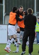 20 August 2010; Mark Quigley, Bohemians, is congratulated by subs after scoring the opening goal. Airtricity League Premier Division, Dundalk v Bohemians Oriel Park, Dundalk, Co. Louth. Picture credit: Oliver McVeigh / SPORTSFILE