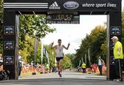 21 August 2010; Andy Douglas, from Inverclyde A.C., Scotland, celebrates winning the Lifestyle Sports-adidas Frank Duffy 10 Mile race. Lifestyle Sports-adidas Frank Duffy 10 Mile, The Phoenix Park, Dublin. Picture credit: Stephen McCarthy / SPORTSFILE