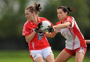 21 August 2010; Aisling Barrett, Cork, in action against Sarah Donnelly, Tyrone. TG4 Ladies Football All-Ireland Senior Championship Quarter-Final, Cork v Tyrone, St Rynagh's, Banagher, Co. Offaly. Picture credit: Brendan Moran / SPORTSFILE