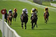 21 August 2010; Banimpire, left, with Kevin Manning up, and Ballybacka Lady, with Danny Mullins up, run up to post during The Loder European Breeders Fund Fillies Race. Horse Racing, Curragh Racecourse, Co. Kildare. Picture credit: Barry Cregg / SPORTSFILE