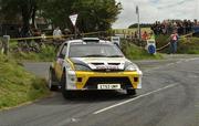 21 August 2010; Aaron Mac Hale and Eugene O'Donnell in their Ford Focus WRC in action during SS11 in the Ulster Rally Round 5 - 2010 Irish Tarmac Rally Championship, Antrim and Mid-Ulster regions. Picture credit: Philip Fitzpatrick / SPORTSFILE