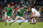 6 July 2016; Jason Scully of Meath, supported by team-mate James Cassidy, left, in action against Sam Doran of Kildare during the Electric Ireland Leinster GAA Football Minor Championship Semi-Final match between Meath and Kildare at Páirc Tailteann in Navan, Co Meath. Photo by Piaras Ó Mídheach/Sportsfile