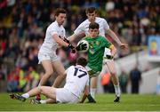 6 July 2016; Jason Scully of Meath in action against Kildare's, from left, Sam Doran, Mark Dempey and Aaron Masterson during the Electric Ireland Leinster GAA Football Minor Championship Semi-Final match between Meath and Kildare at Páirc Tailteann in Navan, Co Meath. Photo by Piaras Ó Mídheach/Sportsfile