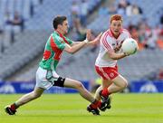 22 August 2010; John McCullagh, Tyrone, in action against Brendan Harrison, Mayo. ESB GAA Football All-Ireland Minor Championship Semi-Final, Mayo v Tyrone, Croke Park, Dublin. Picture credit: Dáire Brennan / SPORTSFILE