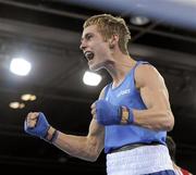 25 August 2010; Ireland's Ryan Burnett, Holy Family Boxing Club, Belfast, celebrates his victory over Salman Alizida, Azerbaijan, following their Light Fly weight, 48kg, Final. Burnett defeated Salman Alizida, of Azerbaijan, 13-6. 2010 Youth Olympic Games, International Convention Centre, Singapore.