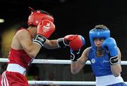 25 August 2010; Ireland's Ryan Burnett, Holy Family Boxing Club, Belfast, right, exchanges punches with Salman Alizida, Azerbaijan, during their Light Fly weight, 48kg, Final. Burnett defeated Salman Alizida, of Azerbaijan, 13-6. 2010 Youth Olympic Games, International Convention Centre, Singapore.