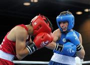 25 August 2010; Ireland's Ryan Burnett, Holy Family Boxing Club, Belfast, right, exchanges punches with Salman Alizida, Azerbaijan, during their Light Fly weight, 48kg, Final. Burnett defeated Salman Alizida, of Azerbaijan, 13-6. 2010 Youth Olympic Games, International Convention Centre, Singapore.