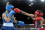 25 August 2010; Ireland's Ryan Burnett, Holy Family Boxing Club, Belfast, left, exchanges punches with Salman Alizida, Azerbaijan, during their Light Fly weight, 48kg, Final. Burnett defeated Salman Alizida, of Azerbaijan, 13-6. 2010 Youth Olympic Games, International Convention Centre, Singapore.