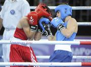 25 August 2010; Ireland's Ryan Burnett, Holy Family Boxing Club, Belfast, right, in action against Salman Alizida, Azerbaijan, during their Light Fly weight, 48kg, Final. Burnett defeated Salman Alizida, of Azerbaijan, 13-6. 2010 Youth Olympic Games, International Convention Centre, Singapore. Picture credit: James Veale / SPORTSFILE