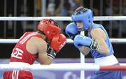 25 August 2010; Ireland's Ryan Burnett, Holy Family Boxing Club, Belfast, right, in action against Salman Alizida, Azerbaijan, during their Light Fly weight, 48kg, Final. Burnett defeated Salman Alizida, of Azerbaijan, 13-6. 2010 Youth Olympic Games, International Convention Centre, Singapore. Picture credit: James Veale / SPORTSFILE