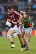 10 July 2016; Robert Finnerty of Galway in action against John Cunnane of Mayo during the Electric Ireland Connacht GAA Football Minor Championship Final between Galway and Mayo at Pearse Stadium in Galway. Photo by Sportsfile