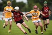 10 July 2016; Jake Carlin of Down in action against Alex O'Boyle of Antrim during the Electric Ireland Ulster GAA Hurling Minor Championship Final match between Antrim and Down at Derry GAA Centre of Excellence in Owenbeg, Derry. Photo by Oliver McVeigh/Sportsfile