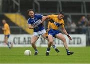 10 July 2016; Gordon Kelly of Clare in action against Paul Cahillane of Laois during the GAA Football All-Ireland Senior Championship - Round 2A match between Clare and Laois at Cusack Park in Ennis, Clare. Photo by Piaras Ó Mídheach/Sportsfile