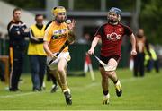 10 July 2016; Diarmuid McShane of Antrim in action against Donal Og Rooney of Down during the Electric Ireland Ulster GAA Hurling Minor Championship Final match between Antrim and Down at Derry GAA Centre of Excellence in Owenbeg, Derry. Photo by Oliver McVeigh/Sportsfile