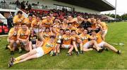 10 July 2016; Antrim players celebrate with the Danny McNauhton cup after the Electric Ireland Ulster GAA Hurling Minor Championship Final match between Antrim and Down at Derry GAA Centre of Excellence in Owenbeg, Derry. Photo by Oliver McVeigh/Sportsfile