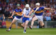10 July 2016; Shane Bennett of Waterford in action against Michael Cahill, right, and Cathal Barrett of Tipperary during the Munster GAA Hurling Senior Championship Final match between Tipperary and Waterford at the Gaelic Grounds in Limerick.  Photo by Stephen McCarthy/Sportsfile