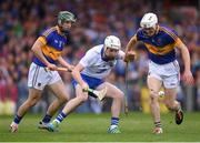 10 July 2016; Shane Bennett of Waterford in action against Michael Cahill, right, and Cathal Barrett of Tipperary during the Munster GAA Hurling Senior Championship Final match between Tipperary and Waterford at the Gaelic Grounds in Limerick.  Photo by Stephen McCarthy/Sportsfile