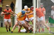 10 July 16; Players from both teams try to claim the sliothar as it goes into the Armagh net during the Ulster GAA Hurling Senior Championship Final match between Antrim and Armagh at Derry GAA Centre of Excellence in Owenbeg, Derry. Photo by Philip Fitzpatrick/Sportsfile.
