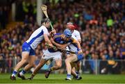 10 July 2016; John McGrath of Tipperary in action against Philip Mahony, left, and Tadhg de Burca of Waterford during the Munster GAA Hurling Senior Championship Final match between Tipperary and Waterford at the Gaelic Grounds in Limerick.  Photo by Ray McManus/Sportsfile
