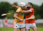 10 July 16; Conor Carson of Antrim in action against Ciaran Clifford of Armagh during the Ulster GAA Hurling Senior Championship Final match between Antrim and Armagh at Derry GAA Centre of Excellence in Owenbeg, Derry. Photo by Oliver McVeigh/Sportsfile