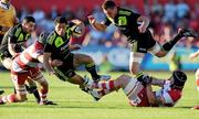 27 August 2010; Doug Howlett, Munster, is tackled by Andrew Hazell, Gloucester, as Munster team-mate Tommy O'Donnell is taken down by Gloucester's Alasdair Strokosch. Pre-Season Friendly, Munster v Gloucester, Musgrave Park, Cork. Picture credit: Matt Browne / SPORTSFILE