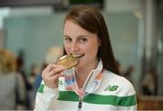 11 July 2016; Ciara Mageean of Ireland with the bronze medal she won in the Women's 1500m Final at the Olympic Stadium in Amsterdam, Netherlands, on Team Ireland's return from European Athletics Championships 2016 at Dublin Airport in Dublin. Photo by Piaras Ó Mídheach/Sportsfile