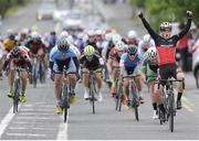 13 July 2016; Colton Brookshire of NCCF Team Specialized celebrates as he crosses the finish line to win Stage 2 of the 2016 Scott Bicycles Junior Tour of Ireland, Ennis - Barefield, Co. Clare. Picture credit: Stephen McMahon/SPORTSFILE