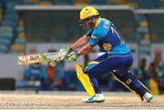 13 July 2016; AB De Villiers plays a switch-hit for four during Match 14 of the Hero Caribbean Premier League match between Barbados Tridents and St Kitts & Nevis Patriots at Kensington Ovan in Bridgetown, Barbados. Photo by Ashley Allen/Sportsfile