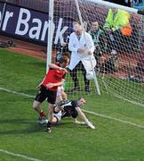 29 August 2010; Down's Benny Coulter punches the ball past Kildare's Emmet Bolton and goalkeeper Shane McCormack into the net for his side's goal in the first half. GAA Football All-Ireland Senior Championship Semi-Final, Kildare v Down, Croke Park, Dublin. Picture credit: Brendan Moran / SPORTSFILE