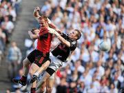 29 August 2010; Brendan Coulter, centre, Down, fists the ball past Emmet Bolton, left, Kildare and Shane McCormack, to score his side's first goal. GAA Football All-Ireland Senior Championship Semi-Final, Kildare v Down, Croke Park, Dublin. Picture credit: Barry Cregg / SPORTSFILE