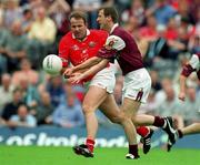 22 July 2001; Gary Fahey of Galway in action against Colin Corkery of Cork during the Bank of Ireland All-Ireland Senior Football Championship Qualifier, round 4, match between Galway and Cork at Croke Park in Dublin. Photo by Ray McManus/Sportsfile