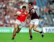 22 July 2001; Martin Cronin of Cork in action against Joe Bergin of Galway during the Bank of Ireland All-Ireland Senior Football Championship Qualifier, round 4, match between Galway and Cork at Croke Park in Dublin. Photo by Brendan Moran/Sportsfile