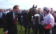 2 August 2001; Winning jockey Paul Carberry and winning trainer Dermot Weld pictured after Ansar won the Guinness Galway Hurdle Handicap during day 4 of the Galway Summer Racing Festival at Ballybrit Racecourse in Galway. Photo by Damien Eagers/Sportsfile