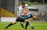 3 September 2010; Nathan Hines, Leinster, is tackled by Max Evans, Glasgow Warriors. Celtic League, Glasgow Warriors v Leinster, Firhill Stadium, Glasgow, Scotland. Picture credit: Brendan Moran / SPORTSFILE