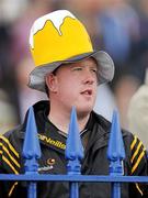 4 September 2010; A Kilkenny hurling supporter keeps an eye on the day's racing. Leopardstown Racecourse, Dublin. Picture credit: Brendan Moran / SPORTSFILE