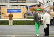 4 September 2010; A colourful punter shoots the breeze with a fellow punter during the day's racing. Leopardstown Racecourse, Dublin. Picture credit: Brendan Moran / SPORTSFILE