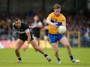 16 July 2016; Eoin Cleary of Clare in action against Neil Ewing of Sligo during the GAA Football All-Ireland Senior Championship Round 3A match between Sligo and Clare at Markievicz Park in Sligo.  Photo by Oliver McVeigh/Sportsfile