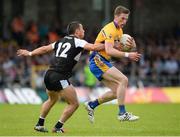 16 July 2016; Eoin Cleary of Clare in action against Neil Ewing of Sligo during the GAA Football All-Ireland Senior Championship Round 3A match between Sligo and Clare at Markievicz Park in Sligo.  Photo by Oliver McVeigh/Sportsfile