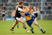 16 July 2016; Pearse Lillis of Clare in action against Daniel Maye of Sligo during the GAA Football All-Ireland Senior Championship Round 3A match between Sligo and Clare at Markievicz Park in Sligo.  Photo by Oliver McVeigh/Sportsfile