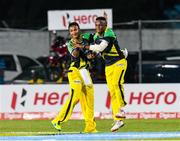 16 July 2016; Andre McCarthy (R) celebrates with Shakib Al Hasan (L) of Jamaica Tallawahs the dismissal of Evin Lewis of St Kitts & Nevis Patriots during Match 17 of the Hero Caribbean Premier League match between Jamaica Tallawahs v St Kitts & Nevis Patriots at Sabina Park in Kingston, Jamaica. Photo by Randy Brooks/Sportsfile