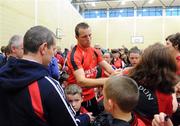 6 September 2010; Down Captain Ambrose Rogers signs autographs during a fans open night ahead of their upcoming GAA Football All-Ireland Championship final against Cork. Abbey Grammar School, Newry, Co. Down. Picture credit: Oliver McVeigh / SPORTSFILE